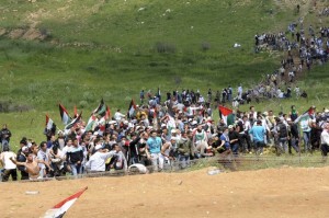 Palestinian refugees marching to Palestine via the Syrian border. May, 2011